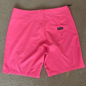 Hot pink Hurley board shorts . excellent condition